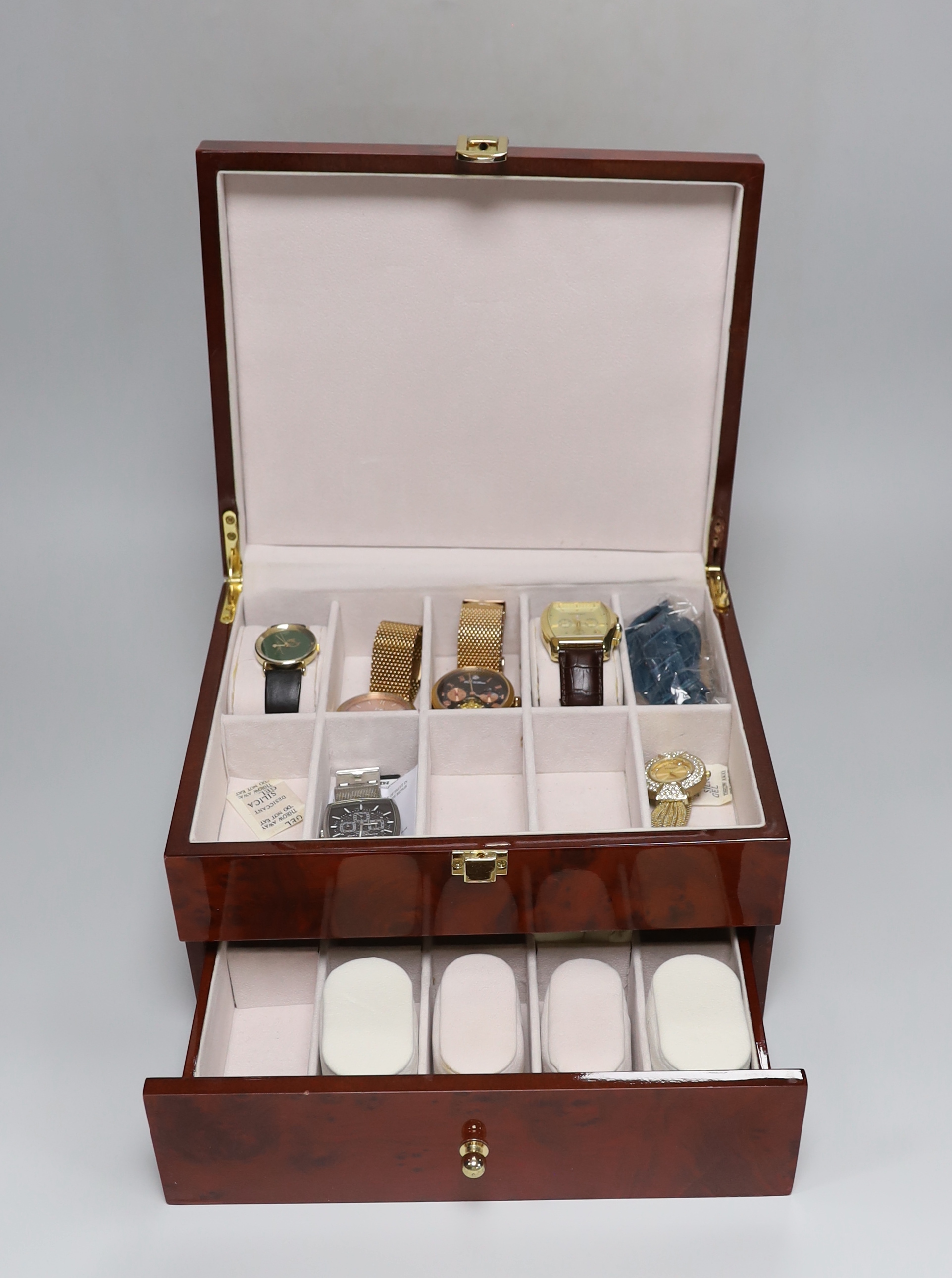 Five gentleman's assorted modern gilt metal or steel wrist watches, including Christin Lars, Labelle & Son, Bermuda Watch Co and Raoul U. Brawn and a lady's Strada quartz wrist watch.